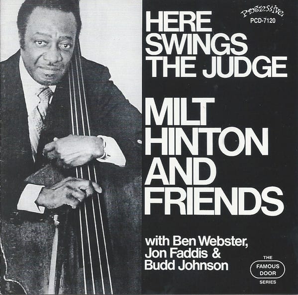 HERE SWINGS THE JUDGE